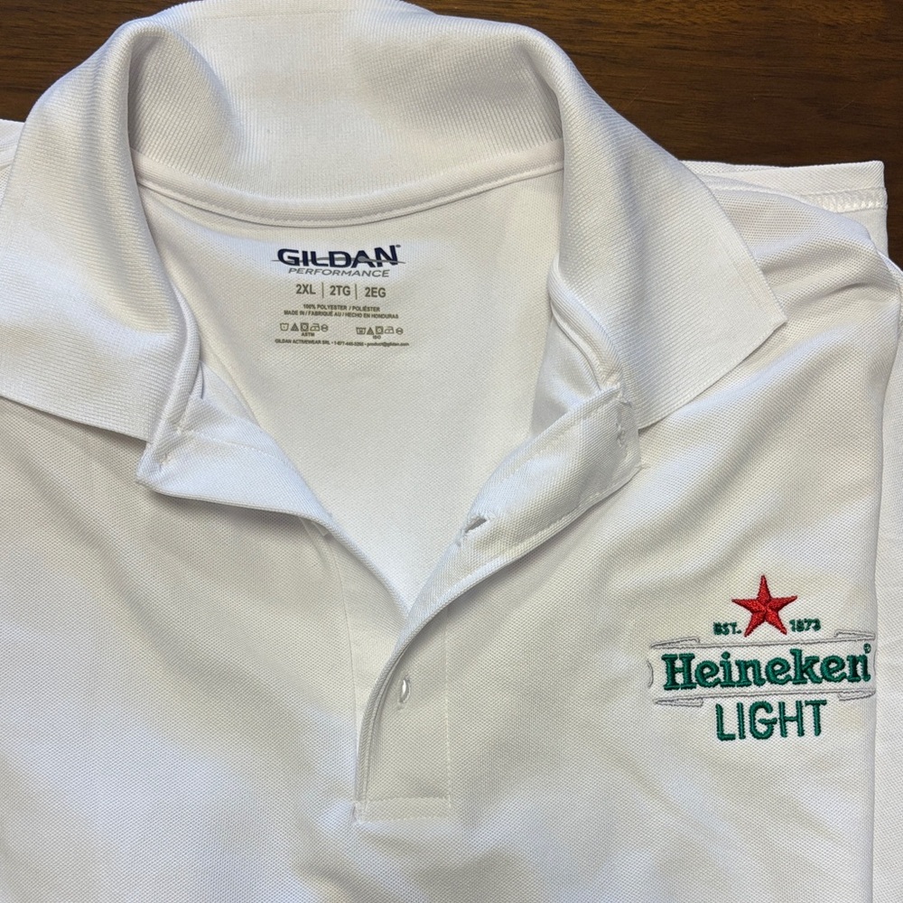 Men’s Golf Shirt 
Like new - never worn 
Embroidered Heineken logo